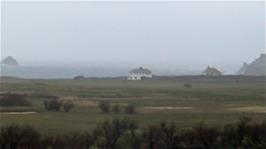 View to a rather misty Booby's Bay, not far from Constantine Bay and the youth hostel at Treyarnon Bay